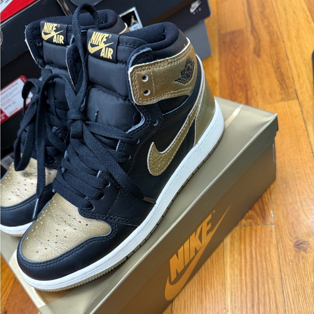 Nike Black and Gold High-Top Sneakers